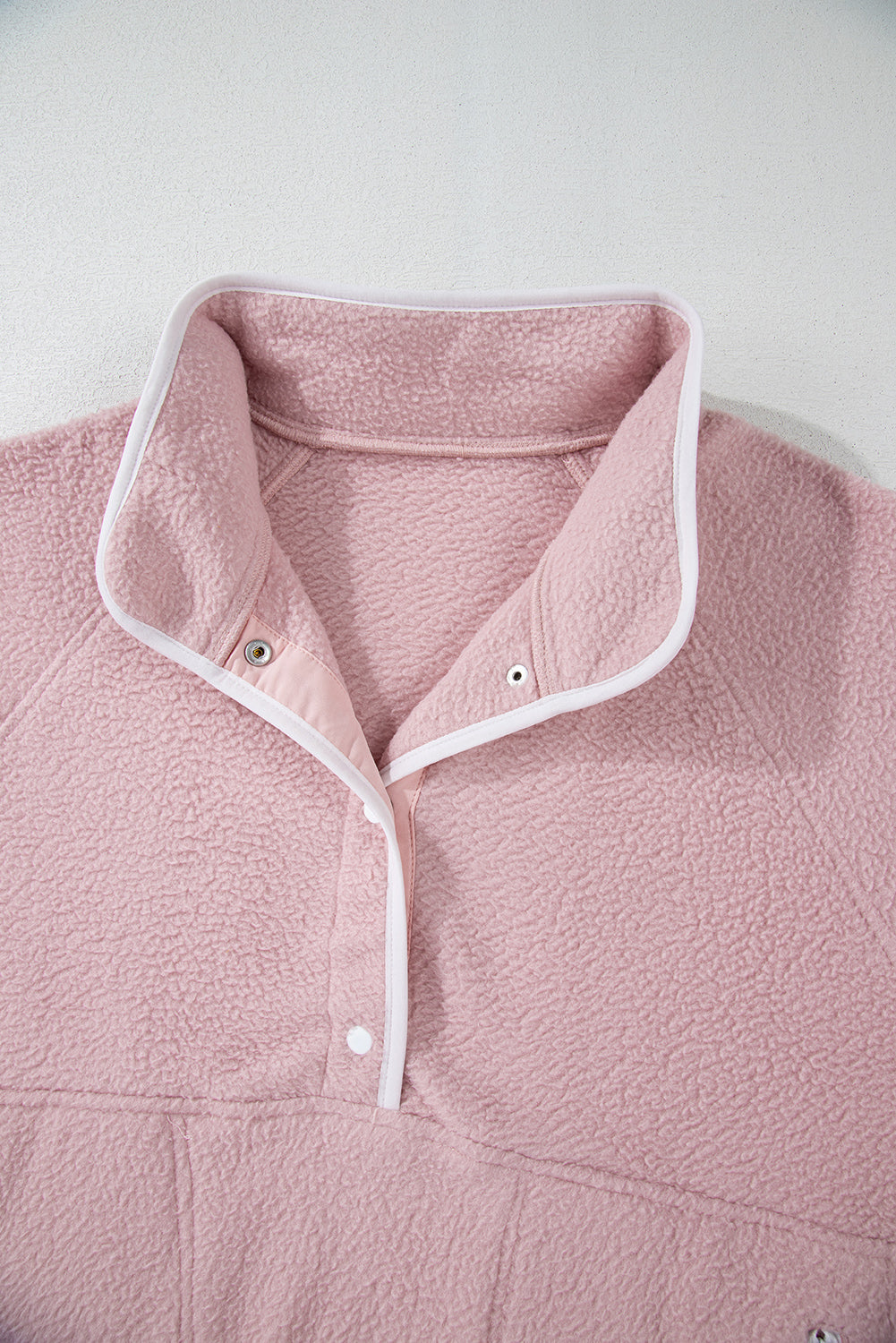 Natalia | Long-sleeved sweatshirt with a half-length snap fastening and side slit pockets