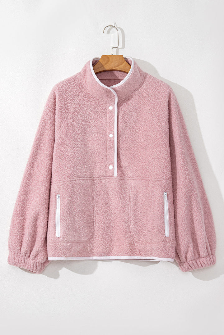 Natalia | Long-sleeved sweatshirt with a half-length snap fastening and side slit pockets