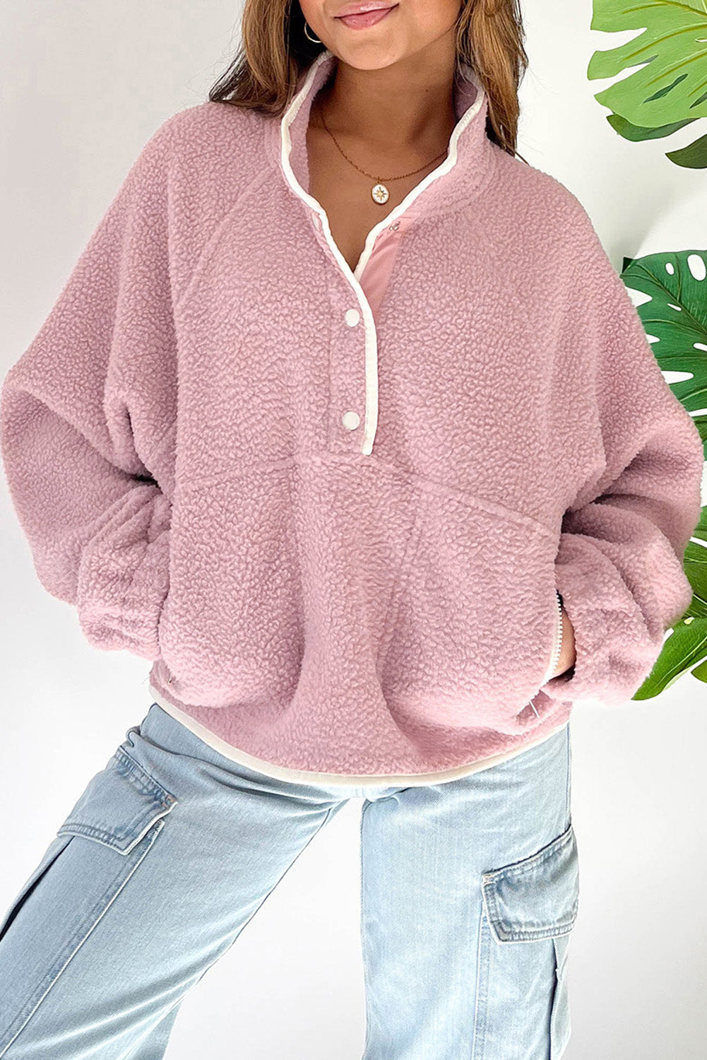 Natalia | Long-sleeved sweatshirt with a half-length snap fastening and side slit pockets