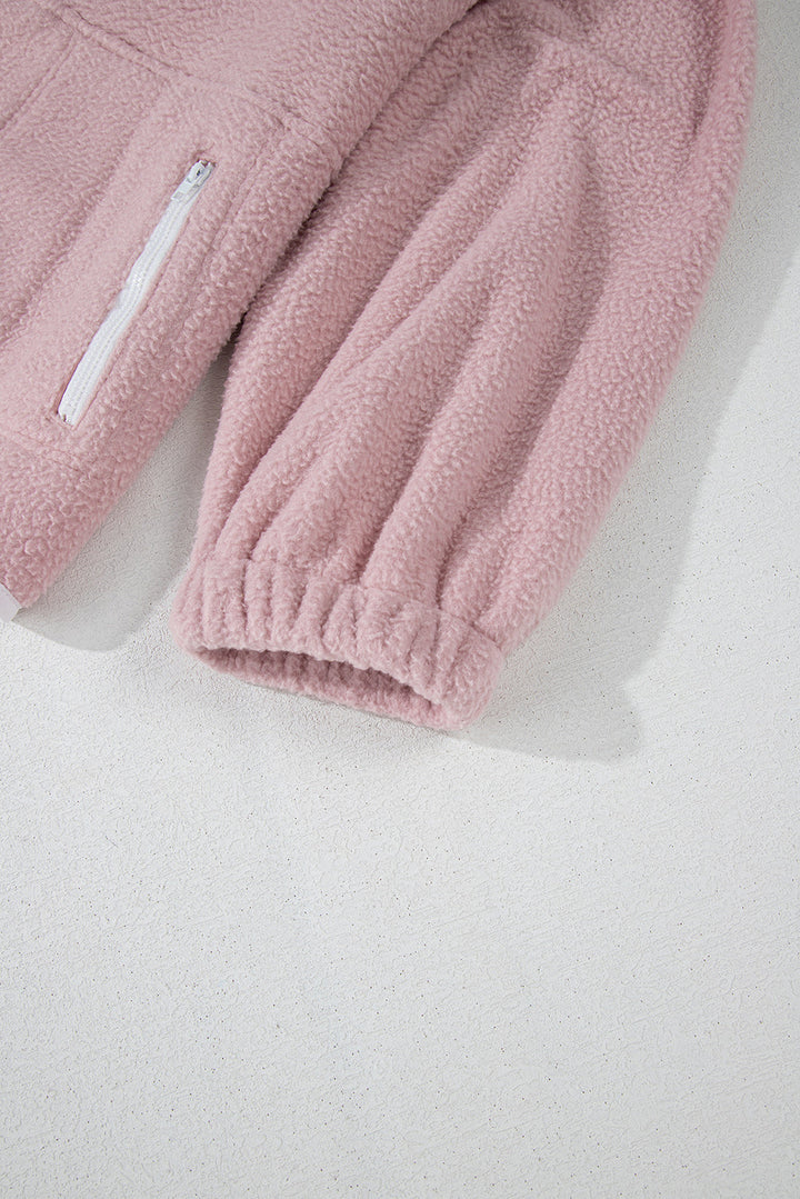 Natalia | Long-sleeved sweatshirt with a half-length snap fastening and side slit pockets