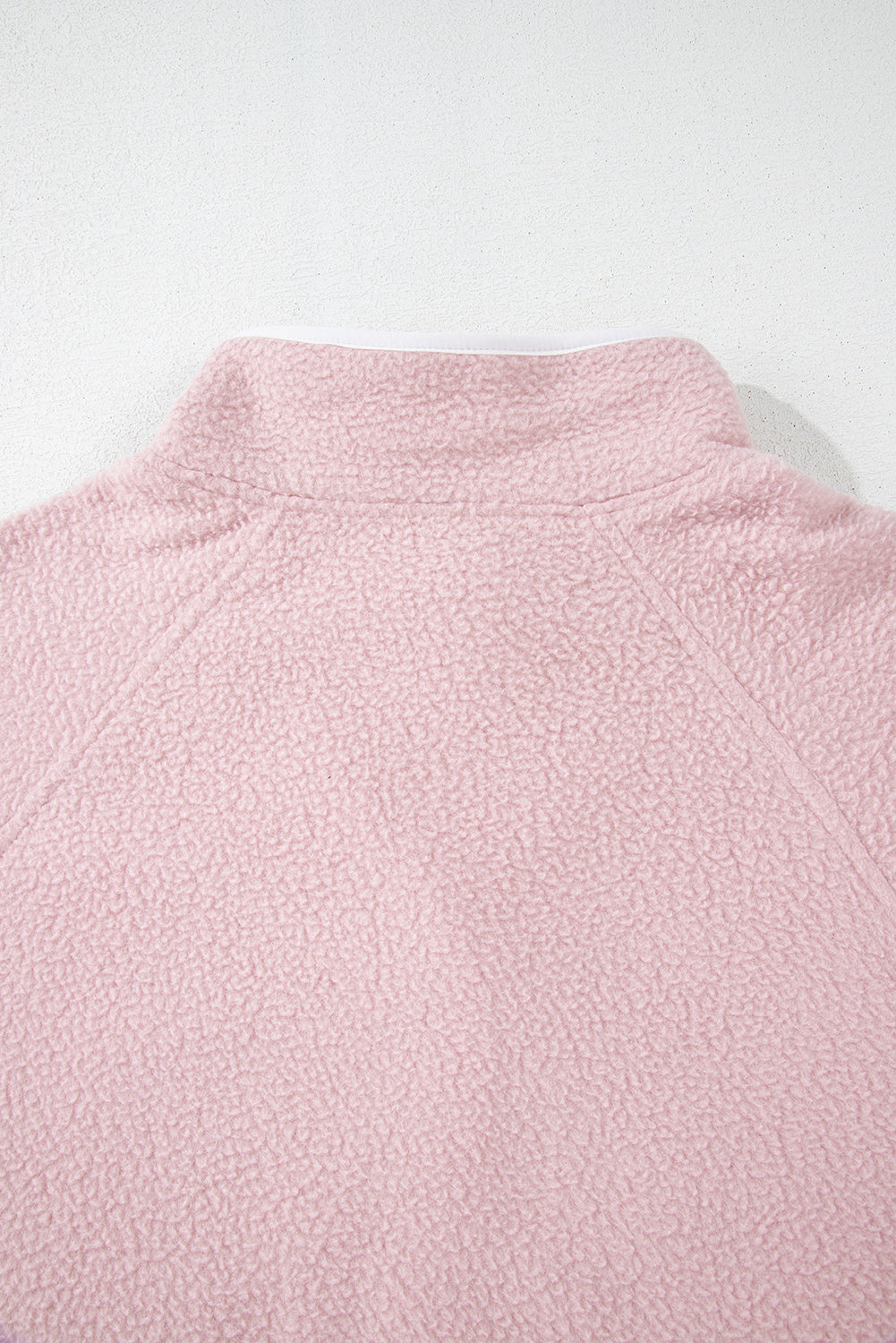 Natalia | Long-sleeved sweatshirt with a half-length snap fastening and side slit pockets